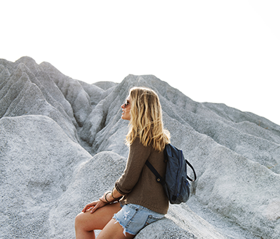 Blond women on a rock