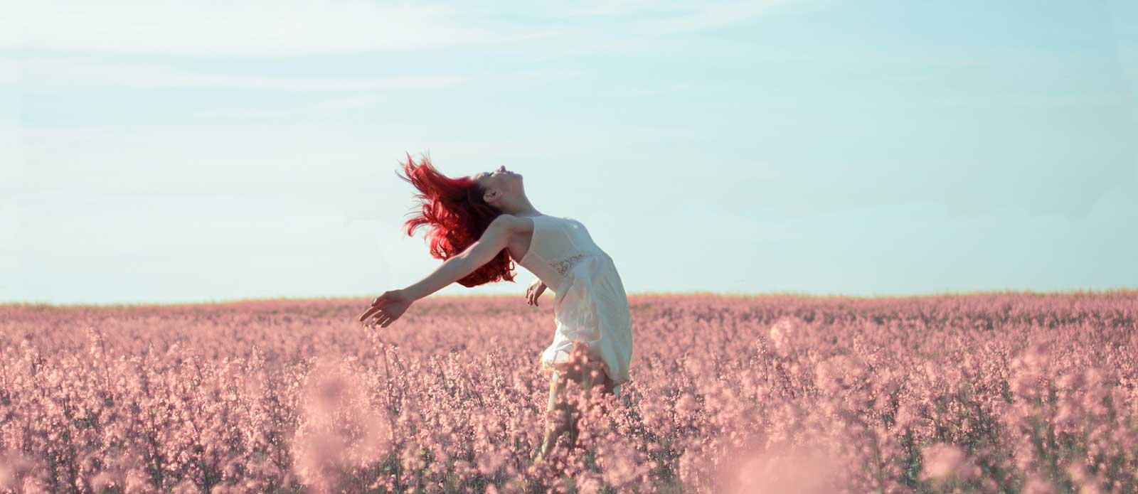 Girl in pink field