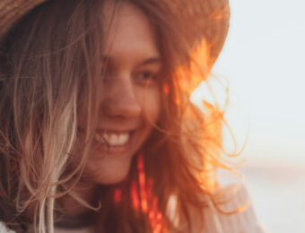 girl with hat in sunshine