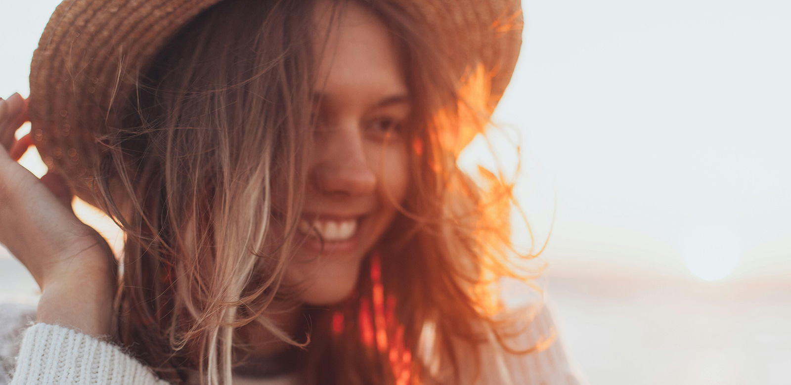 girl with hat in sunshine