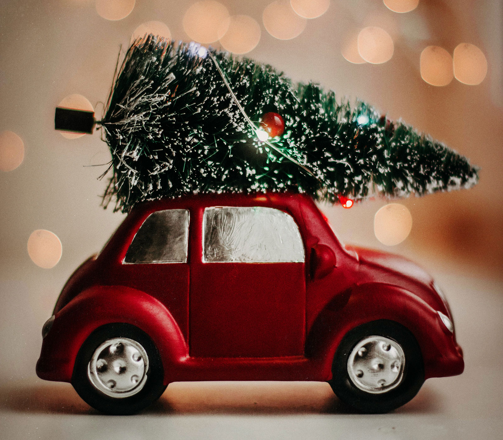 car with Christmas tree