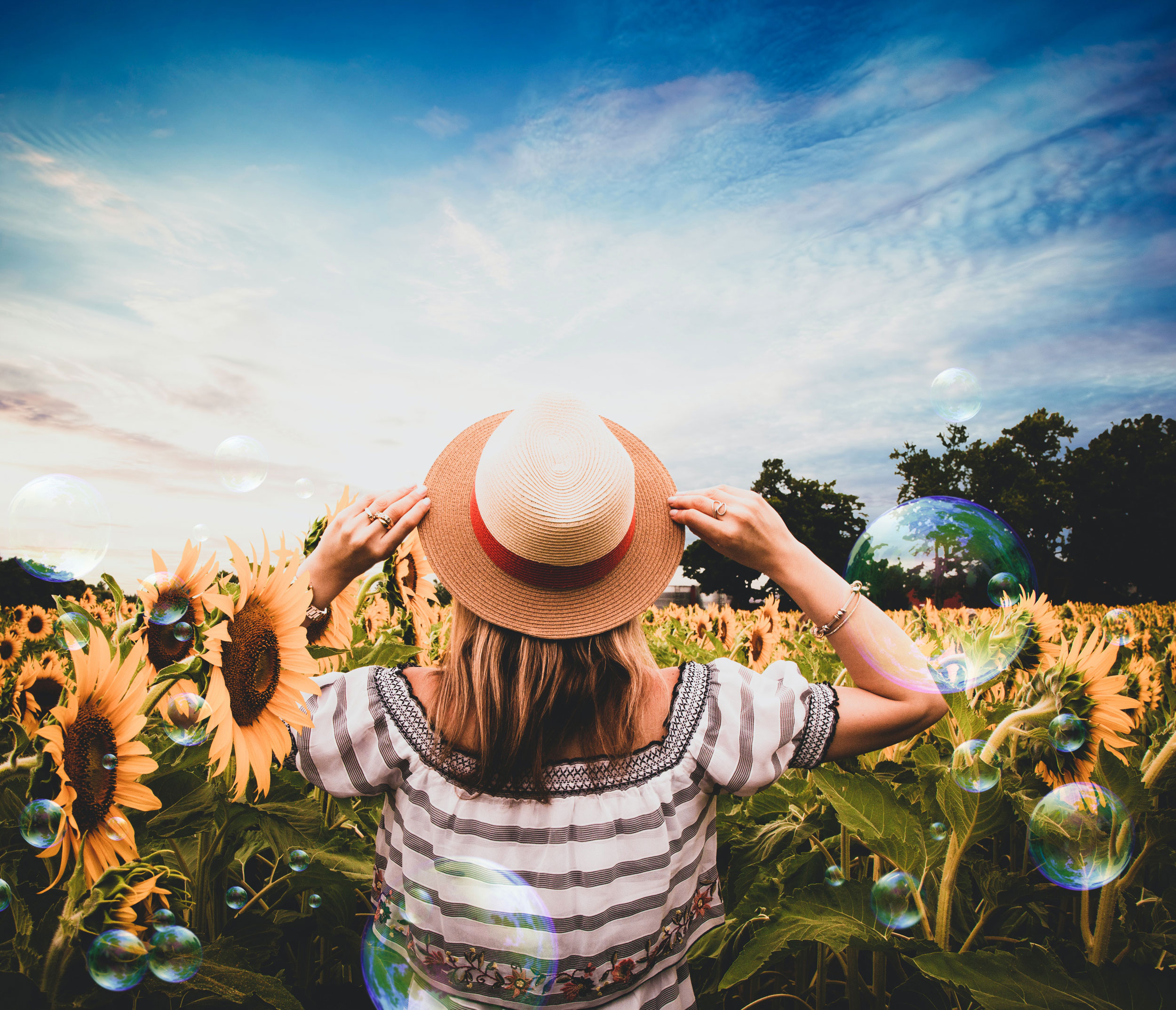 girl in sunflower field